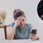woman looking at her phone emotional